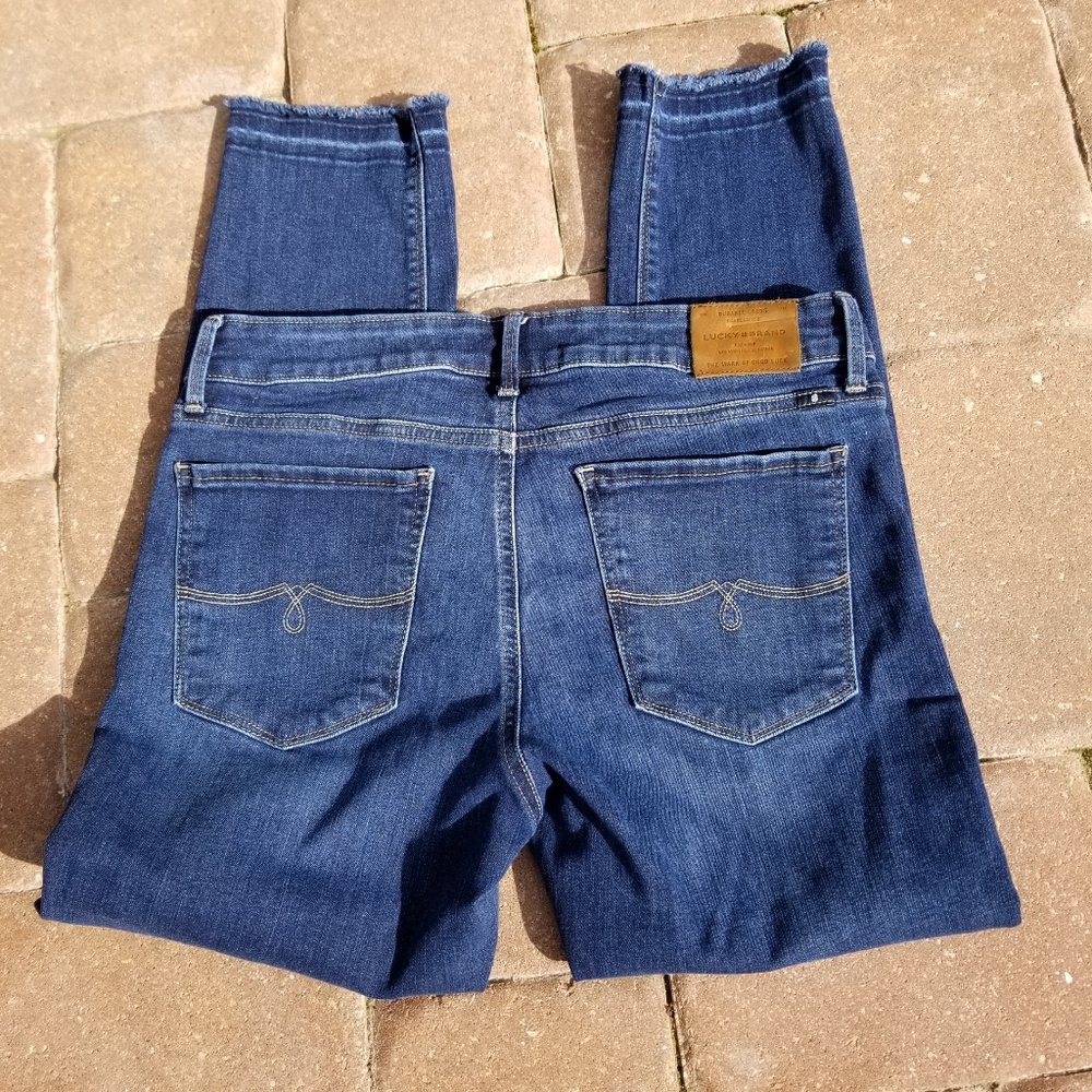 Lucky Brand dungarees jeans.